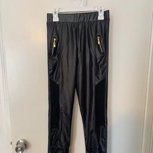 Black pleather pants with mesh detailing